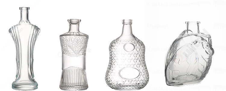 Decorated glass spirits bottles with brand-specific surface finishes